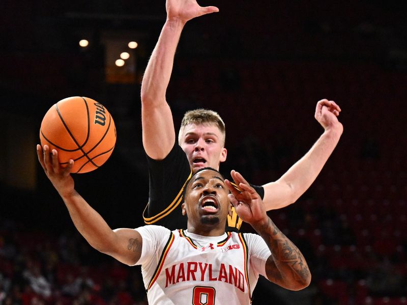 Feb 11, 2026; College Park, Maryland, USA; Maryland Terrapins guard David Coit (8) attempts a lay up in front of Iowa Hawkeyes guard Bennett Stirtz (#14) at Xfinity Center. Mandatory Credit: Jamie Sabau-Imagn Images Feb 11, 2026; College Park, Maryland, USA; Maryland Terrapins guard David Coit (8) attempts a lay up in front of Iowa Hawkeyes guard Bennett Stirtz (#14) at Xfinity Center. Mandatory Credit: Jamie Sabau-Imagn Images