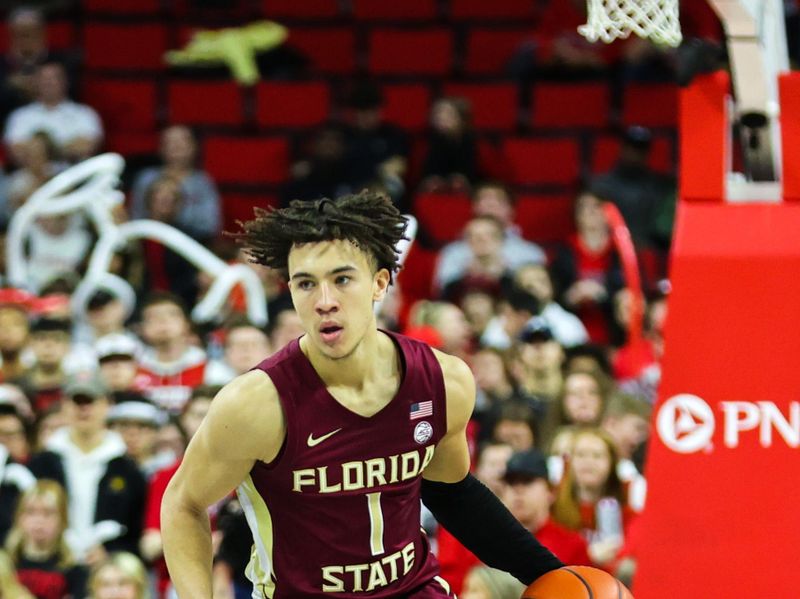 Feb 1, 2023; Raleigh, North Carolina, USA; Florida State Seminoles guard Jalen Warley (1) dribbles down the court with the ball at the game during the second half against North Carolina State Wolfpack at PNC Arena.  Mandatory Credit: Jaylynn Nash-USA TODAY Sports