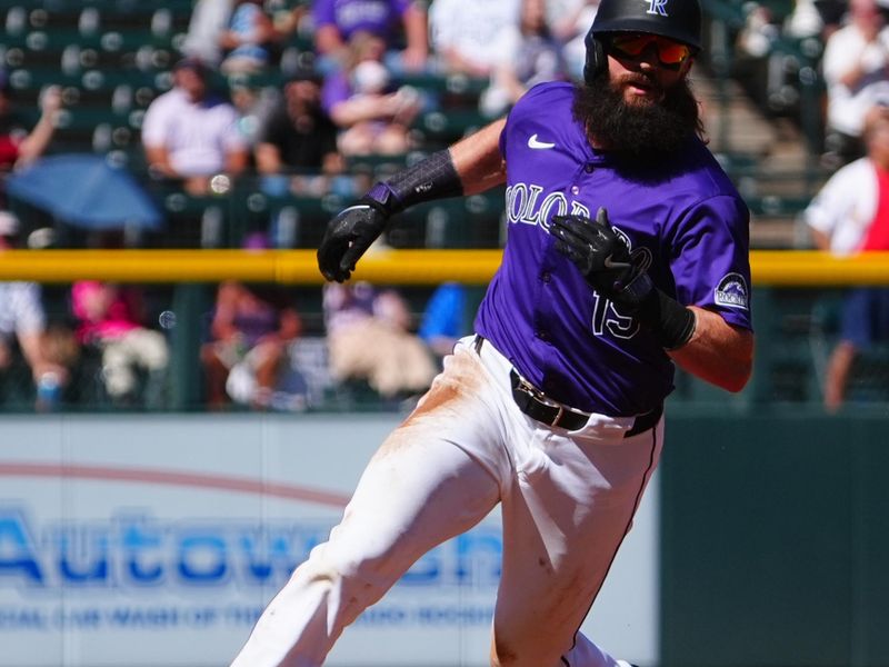 Sep 26, 2024; Denver, Colorado, USA; Colorado Rockies outfielder Charlie Blackmon (19) heads home to score in the first inning against the St. Louis Cardinals at Coors Field. Mandatory Credit: Ron Chenoy-Imagn Images