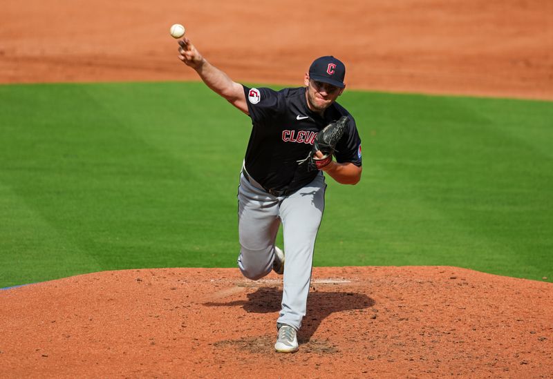 Sep 2, 2024; Kansas City, Missouri, USA; Cleveland Guardians starting pitcher Gavin Williams (32) pitches during the third inning against the Kansas City Royals at Kauffman Stadium. Mandatory Credit: Jay Biggerstaff-USA TODAY Sports