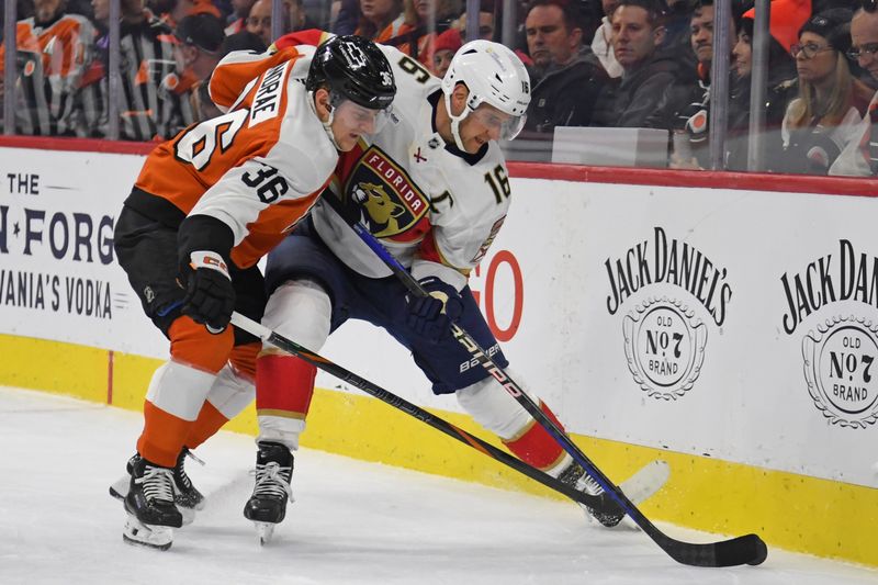 Dec 5, 2024; Philadelphia, Pennsylvania, USA; Philadelphia Flyers defenseman Emil Andrae (36) and Florida Panthers center Aleksander Barkov (16) battle for the puck during the second period at Wells Fargo Center. Mandatory Credit: Eric Hartline-Imagn Images