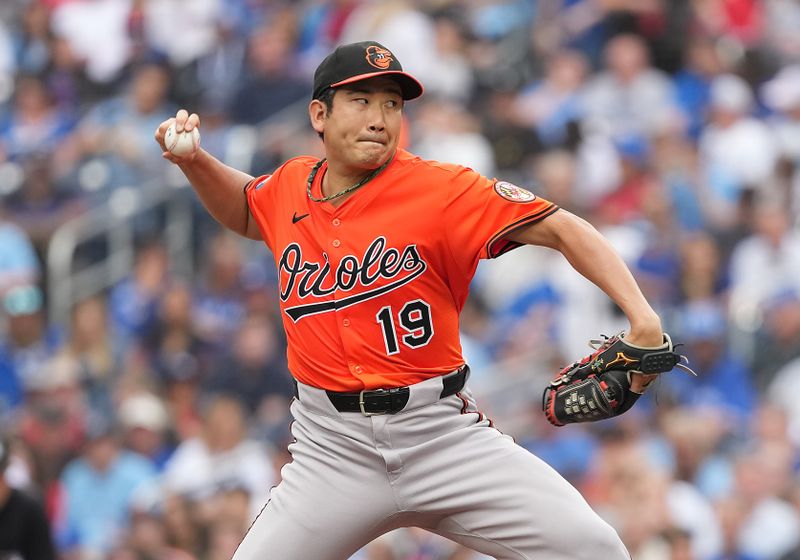 Sep 13, 2025; Toronto, Ontario, CAN; Baltimore Orioles starting pitcher Tomoyuki Sugano (19) throws a pitch against the Toronto Blue Jays during the first inning at Rogers Centre. Mandatory Credit: Nick Turchiaro-Imagn Images