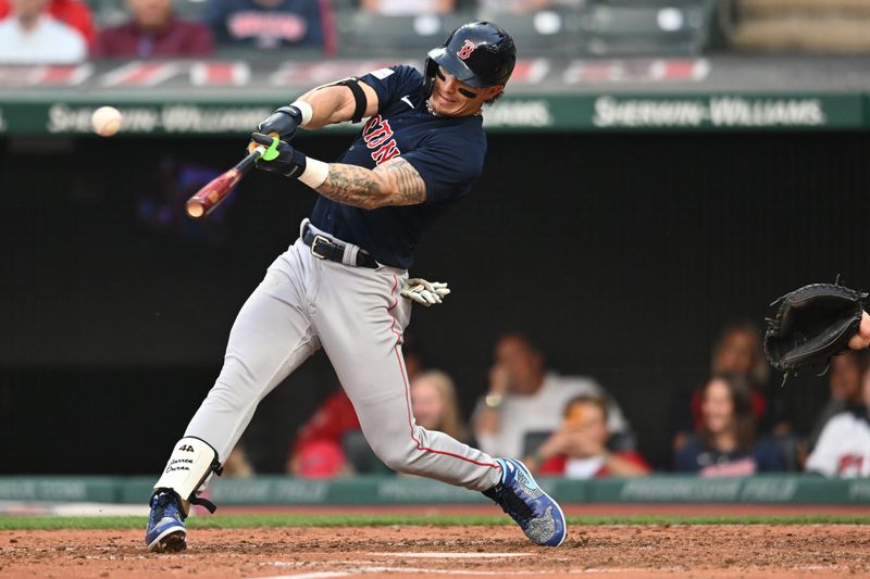 Jun 6, 2023; Cleveland, Ohio, USA; Boston Red Sox center fielder Jarren Duran (16) hits a double during the fifth inning against the Cleveland Guardians at Progressive Field. Mandatory Credit: Ken Blaze-USA TODAY Sports