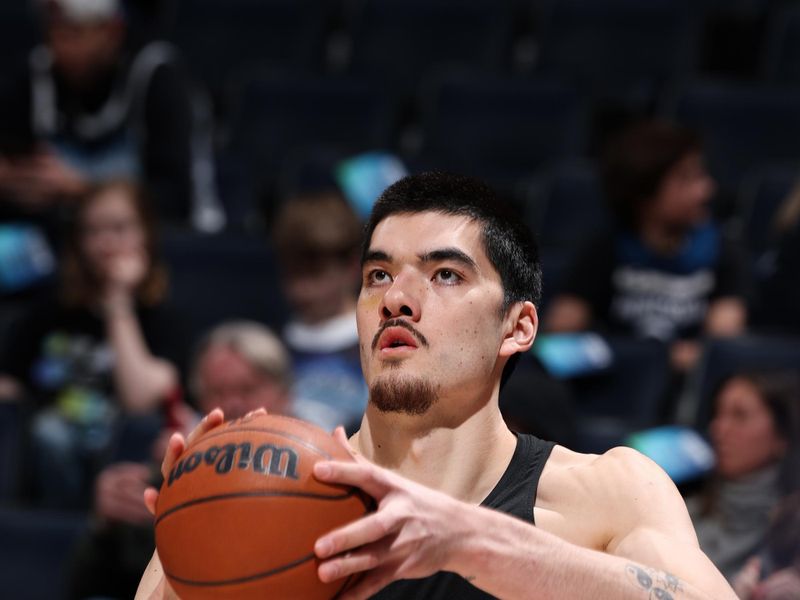 MINNEAPOLIS, MN -  JANUARY 11: Zach Edey #14 of the Memphis Grizzlies warms up before the game against the Minnesota Timberwolves on January 11, 2025 at Target Center in Minneapolis, Minnesota. NOTE TO USER: User expressly acknowledges and agrees that, by downloading and or using this Photograph, user is consenting to the terms and conditions of the Getty Images License Agreement. Mandatory Copyright Notice: Copyright 2025 NBAE (Photo by David Sherman/NBAE via Getty Images)