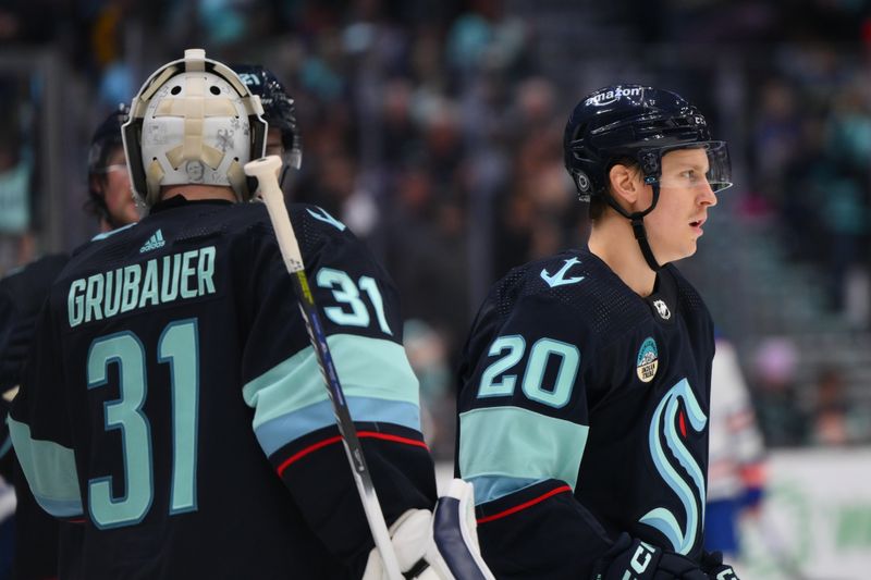 Mar 2, 2024; Seattle, Washington, USA; Seattle Kraken right wing Eeli Tolvanen (20) after scoring a goal against the Edmonton Oilers during the third period at Climate Pledge Arena. Mandatory Credit: Steven Bisig-USA TODAY Sports