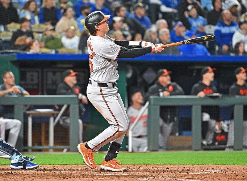 Apr 19, 2024; Kansas City, Missouri, USA; Baltimore Orioles catcher Adley Rutschman (35) hits a grand slam in the seventh inning at against the Kansas City Royals Kauffman Stadium. Mandatory Credit: Peter Aiken-USA TODAY Sports