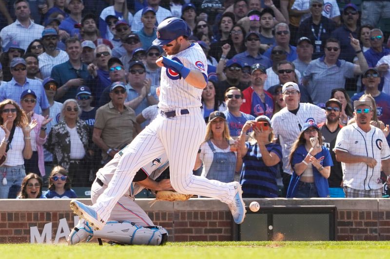 May 7, 2023; Chicago, Illinois, USA; Chicago Cubs left fielder Ian Happ (8) scores against the Miami Marlins during the ninth inning at Wrigley Field. Mandatory Credit: David Banks-USA TODAY Sports