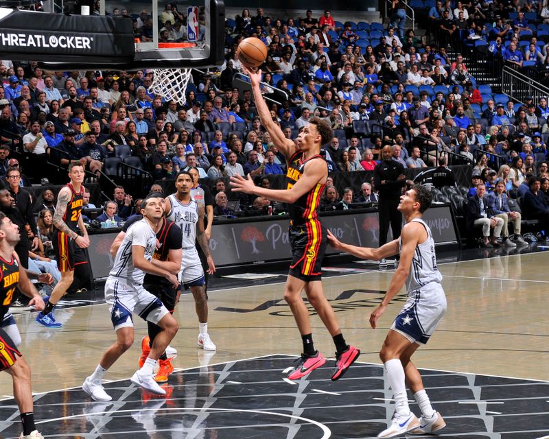 ORLANDO, FL - FEBRUARY 10: Dyson Daniels #5 of the Atlanta Hawks drives to the basket during the game against the Orlando Magic on February 10, 2025 at Kia Center in Orlando, Florida. NOTE TO USER: User expressly acknowledges and agrees that, by downloading and or using this photograph, User is consenting to the terms and conditions of the Getty Images License Agreement. Mandatory Copyright Notice: Copyright 2025 NBAE (Photo by Fernando Medina/NBAE via Getty Images)