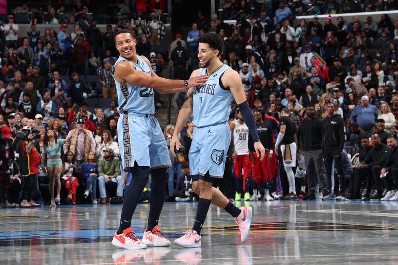 MEMPHIS, TN - NOVEMBER 29: Desmond Bane #22 and Scotty Pippen Jr. #1 of the Memphis Grizzlies smile during the game against the New Orleans Pelicans during the Emirates NBA Cup game on November 29, 2024 at FedExForum in Memphis, Tennessee. NOTE TO USER: User expressly acknowledges and agrees that, by downloading and or using this photograph, User is consenting to the terms and conditions of the Getty Images License Agreement. Mandatory Copyright Notice: Copyright 2024 NBAE (Photo by Joe Murphy/NBAE via Getty Images)