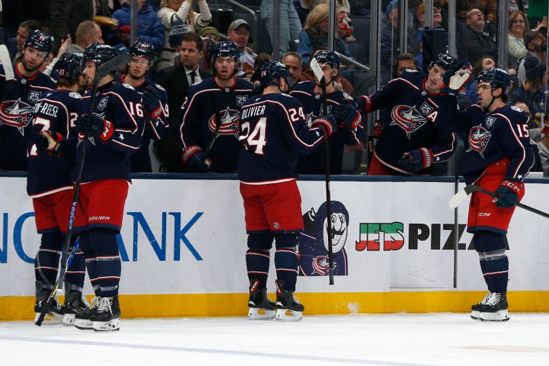 Jan 3, 2026; Columbus, Ohio, USA; Columbus Blue Jackets center Mathieu Olivier (24) celebrates his goal against the Buffalo Sabres  during the second period at Nationwide Arena. Mandatory Credit: Russell LaBounty-Imagn Images