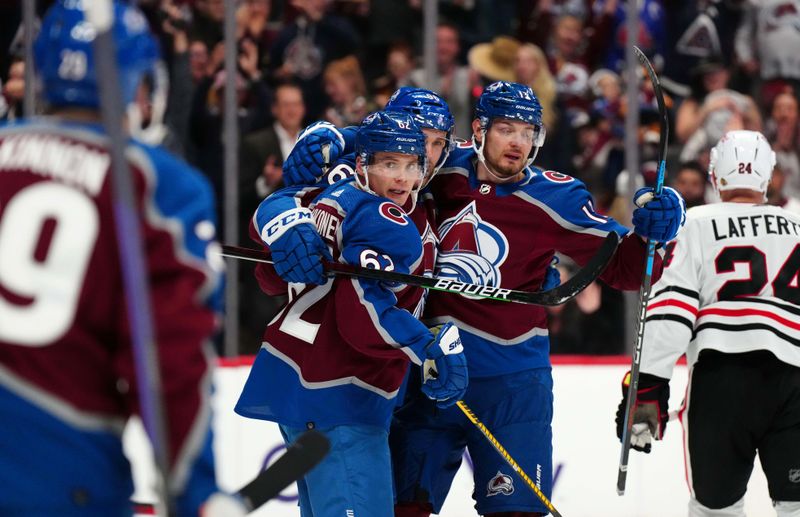 Oct 12, 2022; Denver, Colorado, USA; Colorado Avalanche left wing Artturi Lehkonen (62) celebrates after scoring a goal with right wing Mikko Rantanen (96) and right wing Valeri Nichushkin (13) in the second period against the Chicago Blackhawks at Ball Arena. Mandatory Credit: Ron Chenoy-USA TODAY Sports