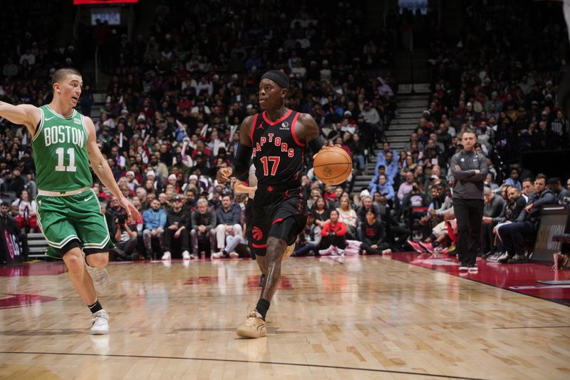 TORONTO, CANADA - JANUARY 15: Dennis Schroder #17 of the Toronto Raptors handles the ball during the game against the Boston Celtics  on January 15, 2024 at the Scotiabank Arena in Toronto, Ontario, Canada.  NOTE TO USER: User expressly acknowledges and agrees that, by downloading and or using this Photograph, user is consenting to the terms and conditions of the Getty Images License Agreement.  Mandatory Copyright Notice: Copyright 2024 NBAE (Photo by Mark Blinch/NBAE via Getty Images)