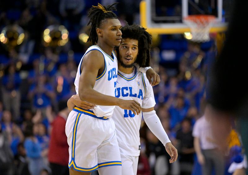 Feb 16, 2023; Los Angeles, California, USA;   UCLA Bruins guard Dylan Andrews (2) and guard Tyger Campbell (10) walk off the court after defeating the Stanford Cardinal at Pauley Pavilion presented by Wescom. Mandatory Credit: Jayne Kamin-Oncea-USA TODAY Sports