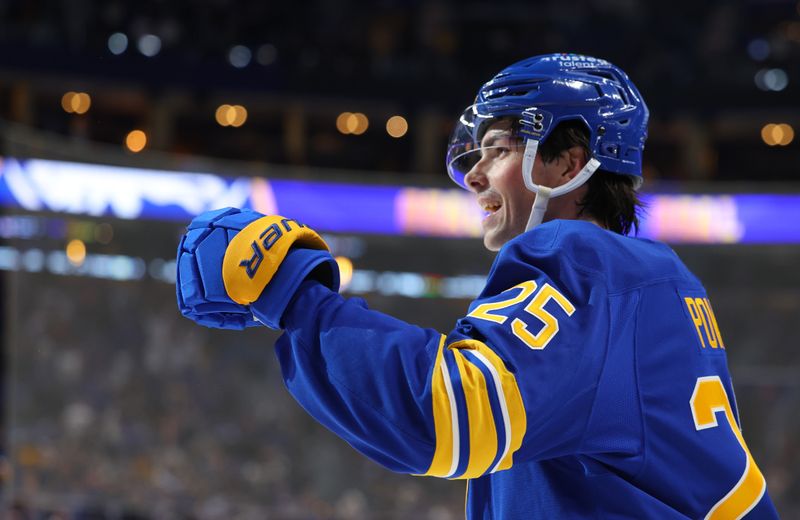 Oct 18, 2025; Buffalo, New York, USA;  Buffalo Sabres defenseman Owen Power (25) reacts after scoring a goal during the second period against the Florida Panthers at KeyBank Center. Mandatory Credit: Timothy T. Ludwig-Imagn Images