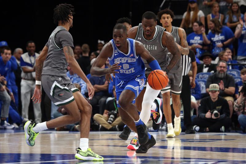 Mar 3, 2024; Memphis, Tennessee, USA; Memphis Tigers forward David Jones (8) dribbles up the court after a steal during the first half against the UAB Blazers at FedExForum. Mandatory Credit: Petre Thomas-USA TODAY Sports