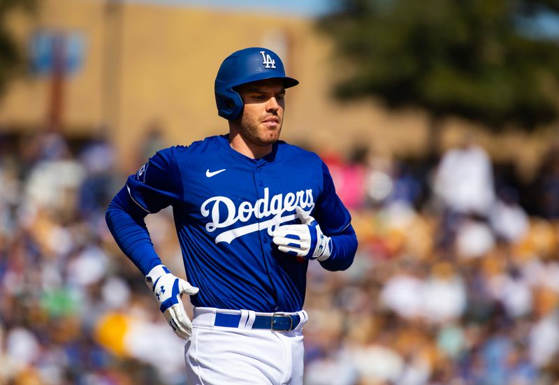 Feb 23, 2024; Phoenix, Arizona, USA; Los Angeles Dodgers first baseman Freddie Freeman against the San Diego Padres during a spring training game at Camelback Ranch-Glendale. Mandatory Credit: Mark J. Rebilas-USA TODAY Sports