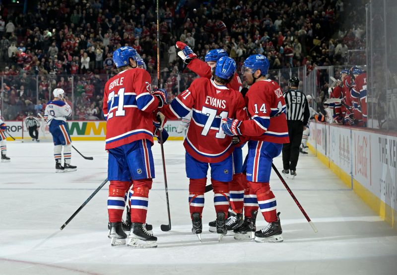 Nov 18, 2024; Montreal, Quebec, CAN; Montreal Canadiens forward Jake Evans (71) celebrates with teammates after scoring a goal against the Edmonton Oilers during the third period at the Bell Centre. Mandatory Credit: Eric Bolte-Imagn Images