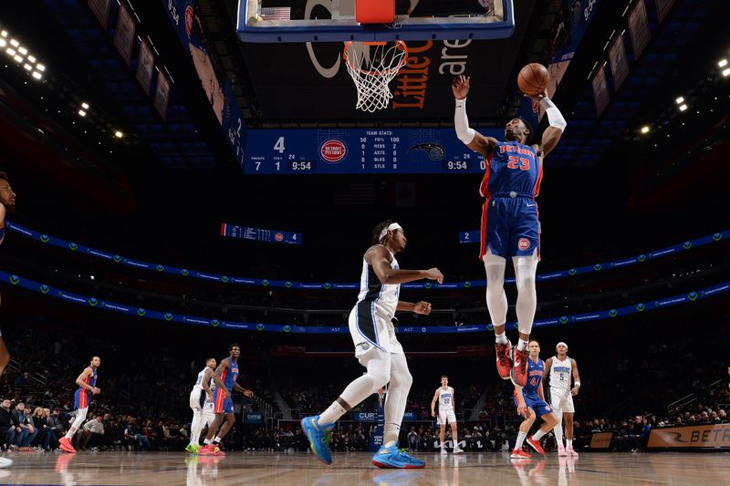 DETROIT, MI - FEBRUARY 4: Jaden Ivey #23 of the Detroit Pistons rebounds the ball during the game  against the Orlando Magicon February 4, 2024 at Little Caesars Arena in Detroit, Michigan. NOTE TO USER: User expressly acknowledges and agrees that, by downloading and/or using this photograph, User is consenting to the terms and conditions of the Getty Images License Agreement. Mandatory Copyright Notice: Copyright 2024 NBAE (Photo by Chris Schwegler/NBAE via Getty Images)