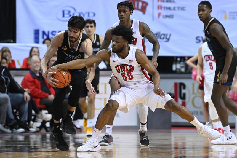 Feb 14, 2023; Las Vegas, Nevada, USA; San Jose State Spartans forward Tibet Gorener (31) is fouled by UNLV Runnin' Rebels guard EJ Harkless (55) in the first half at Thomas & Mack Center. Mandatory Credit: Candice Ward-USA TODAY Sports