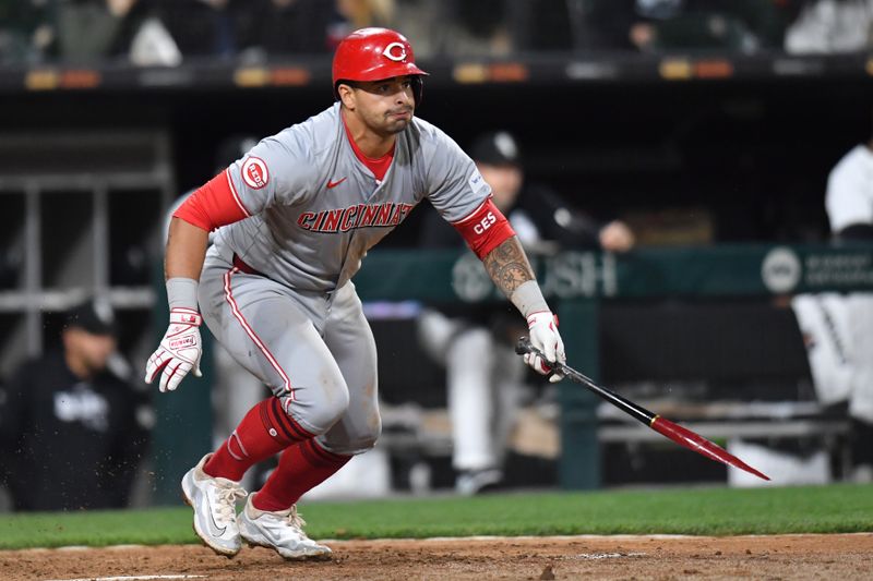 Apr 12, 2024; Chicago, Illinois, USA; Cincinnati Reds first base Christian Encarnacion-Strand (33) hits a two-run single while breaking his bat during the eighth inning against the Chicago White Sox at Guaranteed Rate Field. Mandatory Credit: Patrick Gorski-USA TODAY Sports