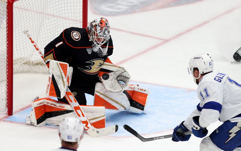 Mar 24, 2024; Anaheim, California, USA; Anaheim Ducks goaltender Lukas Dostal (1) makes a save during the third period against the Tampa Bay Lightning at Honda Center. Mandatory Credit: Jason Parkhurst-USA TODAY Sports