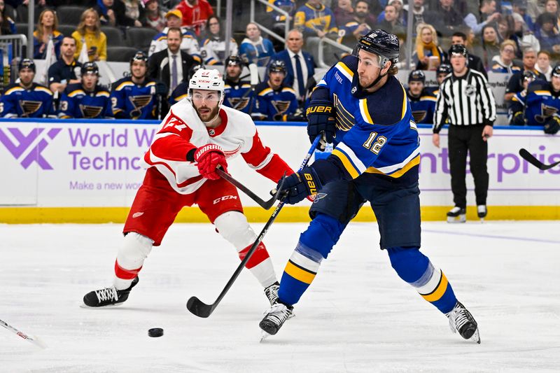 Dec 12, 2023; St. Louis, Missouri, USA;  St. Louis Blues right wing Kevin Hayes (12) shoots and score against the Detroit Red Wings during the second period at Enterprise Center. Mandatory Credit: Jeff Curry-USA TODAY Sports