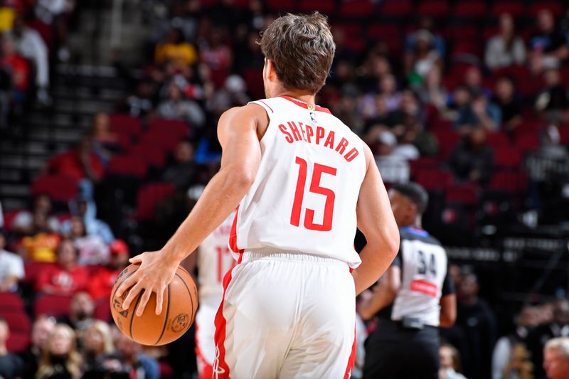 HOUSTON, TX - OCTOBER 17: Reed Sheppard #15 of the Houston Rockets brings the ball up court during the game against the San Antonio Spurs on October 17, 2024 at the Toyota Center in Houston, Texas. NOTE TO USER: User expressly acknowledges and agrees that, by downloading and or using this photograph, User is consenting to the terms and conditions of the Getty Images License Agreement. Mandatory Copyright Notice: Copyright 2024 NBAE (Photo by Logan Riely/NBAE via Getty Images)