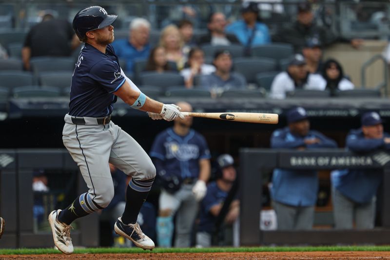 May 4, 2025; Bronx, New York, USA; Tampa Bay Rays shortstop Taylor Walls (6) doubles during the fifth inning against the New York Yankees at Yankee Stadium. Mandatory Credit: Vincent Carchietta-Imagn Images