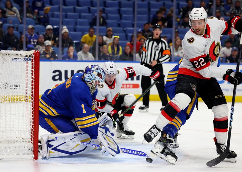 Nov 5, 2024; Buffalo, New York, USA;  Ottawa Senators right wing Michael Amadio (22) tries to deflect a shot on Buffalo Sabres goaltender Ukko-Pekka Luukkonen (1) during the first period at KeyBank Center. Mandatory Credit: Timothy T. Ludwig-Imagn Images