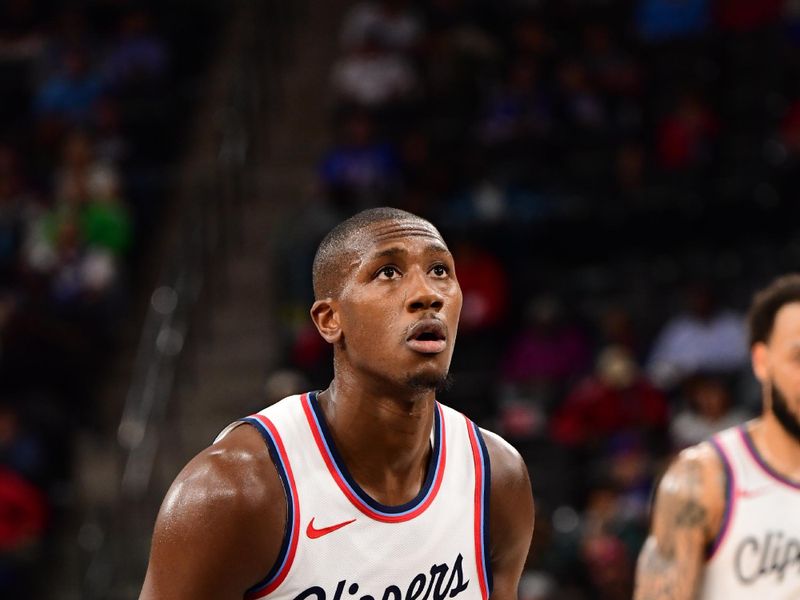 INGLEWOOD, CA - OCTOBER 14: Kris Dunn #8 of the LA Clippers prepares to shoot a free throw during the game against the Dallas Mavericks during a NBA Preseason game on October 14, 2024 at the Intuit Dome in Inglewood, California. NOTE TO USER: User expressly acknowledges and agrees that, by downloading and/or using this Photograph, user is consenting to the terms and conditions of the Getty Images License Agreement. Mandatory Copyright Notice: Copyright 2024 NBAE (Photo by Adam Pantozzi/NBAE via Getty Images)