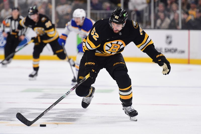 Oct 30, 2025; Boston, Massachusetts, USA; Boston Bruins center Sean Kuraly (52) skates with the puck during the third period against the Buffalo Sabres at TD Garden. Mandatory Credit: Bob DeChiara-Imagn Images