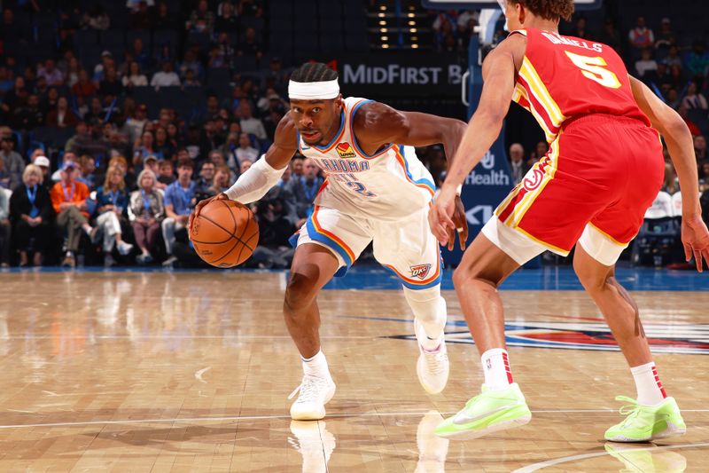 OKLAHOMA CITY, OK - OCTOBER 17: Shai Gilgeous-Alexander #2 of the Oklahoma City Thunder drives to the basket during the game against the Atlanta Hawks on October 17, 2024 at Paycom Arena in Oklahoma City, Oklahoma. NOTE TO USER: User expressly acknowledges and agrees that, by downloading and or using this photograph, User is consenting to the terms and conditions of the Getty Images License Agreement. Mandatory Copyright Notice: Copyright 2024 NBAE (Photo by Zach Beeker/NBAE via Getty Images)