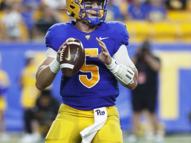 Sep 9, 2023; Pittsburgh, Pennsylvania, USA; Pittsburgh Panthers quarterback Phil Jurkovec (5) looks to pass against the Cincinnati Bearcats during the fourth quarter at Acrisure Stadium. The Bearcats won 27-21. Mandatory Credit: Charles LeClaire-USA TODAY Sports