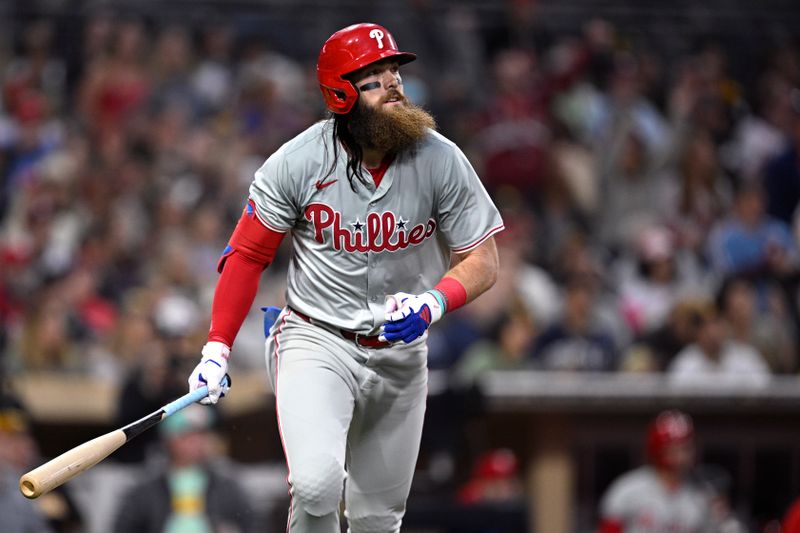 Apr 26, 2024; San Diego, California, USA; Philadelphia Phillies left fielder Brandon Marsh (16) watches his two-run home run during the third inning against the San Diego Padres at Petco Park. Mandatory Credit: Orlando Ramirez-USA TODAY Sports