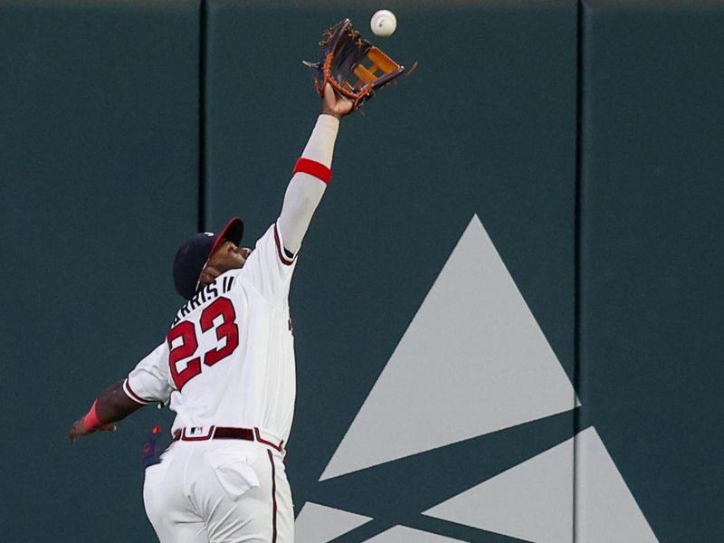 Sep 7, 2023; Atlanta, Georgia, USA; Atlanta Braves center fielder Michael Harris II (23) catches a fly ball against the St. Louis Cardinals in the ninth inning at Truist Park. Mandatory Credit: Brett Davis-USA TODAY Sports