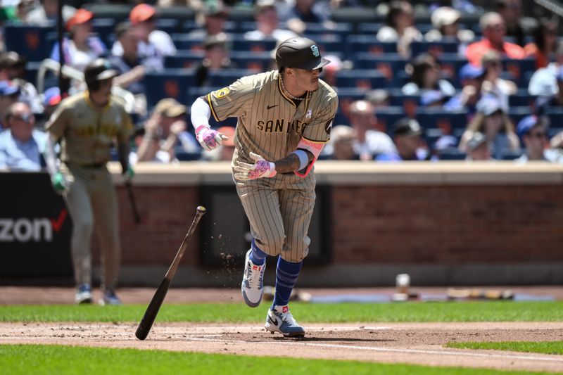 Jun 16, 2024; New York City, New York, USA; San Diego Padres third baseman Manny Machado (13) hits an RBI single during his MLB baseball game against the New York Mets during the first inning at Citi Field. Mandatory Credit: John Jones-USA TODAY Sports