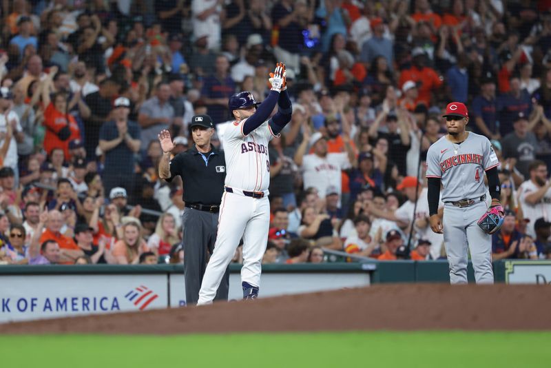 May 10, 2025; Houston, Texas, USA; Houston Astros first baseman Christian Walker (8) celebrates after hitting a triple during the third inning against the Cincinnati Reds at Daikin Park. Mandatory Credit: Troy Taormina-Imagn Images