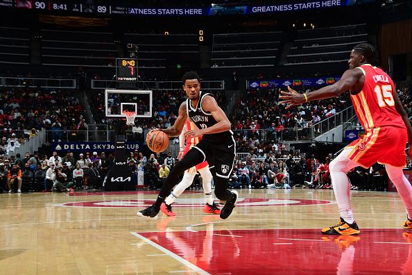 ATLANTA, GA - DECEMBER 6: Nicolas Claxton #33 of the Brooklyn Nets dribbles the ball during the game against the Atlanta Hawks on December 6, 2023 at State Farm Arena in Atlanta, Georgia.  NOTE TO USER: User expressly acknowledges and agrees that, by downloading and/or using this Photograph, user is consenting to the terms and conditions of the Getty Images License Agreement. Mandatory Copyright Notice: Copyright 2023 NBAE (Photo by Scott Cunningham/NBAE via Getty Images)