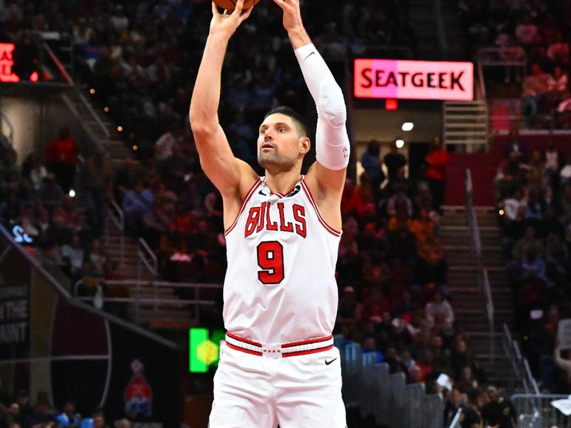 CLEVELAND, OHIO - NOVEMBER 15: Nikola Vucevic #9 of the Chicago Bulls shoots during the fourth quarter of the Emirates NBA Cup game against the Cleveland Cavaliers at Rocket Mortgage Fieldhouse on November 15, 2024 in Cleveland, Ohio. The Cavaliers defeated the Bulls 144-126. NOTE TO USER: User expressly acknowledges and agrees that, by downloading and or using this photograph, User is consenting to the terms and conditions of the Getty Images License Agreement. (Photo by Jason Miller/Getty Images)