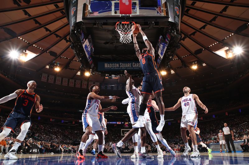 NEW YORK, NY - MARCH 12:  OG Anunoby #8 of the New York Knicks drives to the basket during the game against the Philadelphia 76ers on March 12, 2024 at Madison Square Garden in New York City, New York.  NOTE TO USER: User expressly acknowledges and agrees that, by downloading and or using this photograph, User is consenting to the terms and conditions of the Getty Images License Agreement. Mandatory Copyright Notice: Copyright 2024 NBAE  (Photo by Nathaniel S. Butler/NBAE via Getty Images)