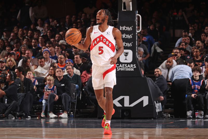 NEW YORK, NY - JANUARY 20: Immanuel Quickley #5 of the Toronto Raptors dribbles the ball during the game against the New York Knicks on January 20, 2024 at Madison Square Garden in New York City, New York.  NOTE TO USER: User expressly acknowledges and agrees that, by downloading and or using this photograph, User is consenting to the terms and conditions of the Getty Images License Agreement. Mandatory Copyright Notice: Copyright 2024 NBAE  (Photo by Nathaniel S. Butler/NBAE via Getty Images)