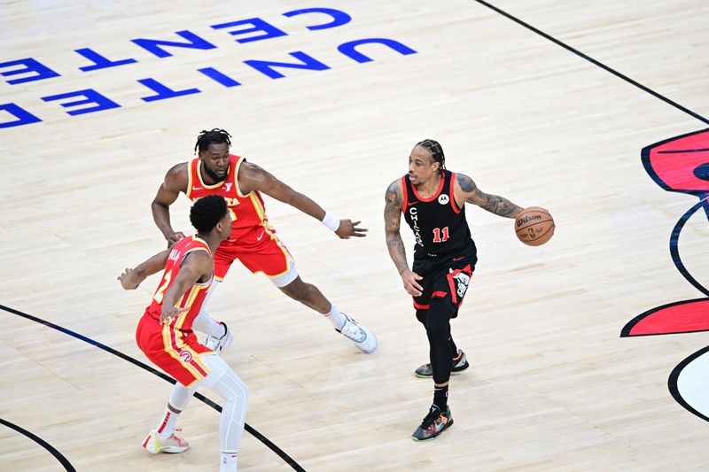 CHICAGO, IL - APRIL 1: DeMar DeRozan #11 of the Chicago Bulls dribbles the ball during the game against the Atlanta Hawks on April 1, 2024 at United Center in Chicago, Illinois. NOTE TO USER: User expressly acknowledges and agrees that, by downloading and or using this photograph, User is consenting to the terms and conditions of the Getty Images License Agreement. Mandatory Copyright Notice: Copyright 2024 NBAE (Photo by Adam Hagy/NBAE via Getty Images)