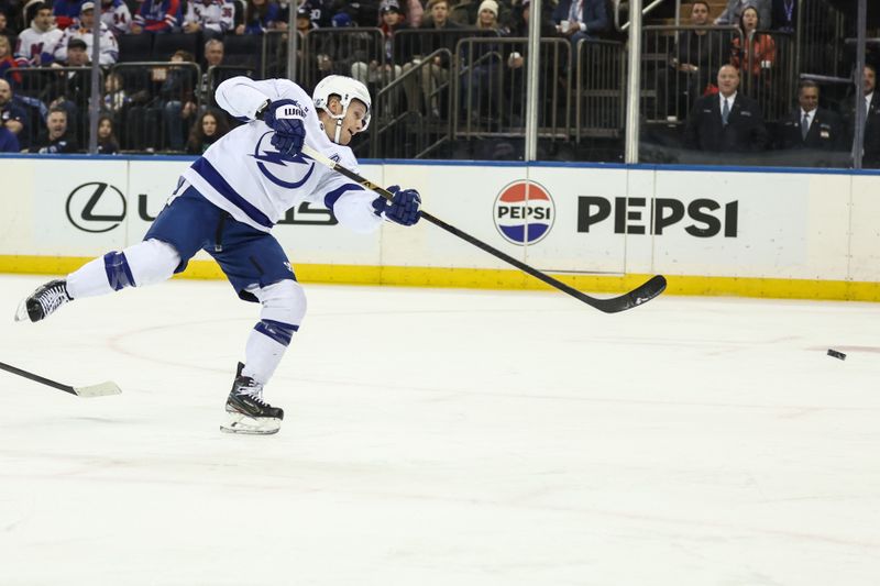 Nov 29, 2025; New York, New York, USA;  Tampa Bay Lightning center Jake Guentzel (59) attempts a shot on goal in the first period against the New York Rangers at Madison Square Garden. Mandatory Credit: Wendell Cruz-Imagn Images