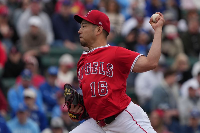 Mar 14, 2025; Tempe, Arizona, USA; Los Angeles Angels pitcher Yusei Kikuchi (16) throws against the Kansas City Royals in the second inning at Tempe Diablo Stadium. Mandatory Credit: Rick Scuteri-Imagn Images