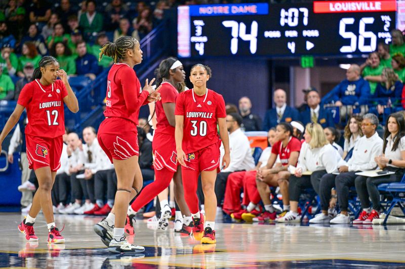 Mar 3, 2024; South Bend, Indiana, USA; Louisville Cardinals guard Jayda Curry (30) reacts in the second half against the Notre Dame Fighting Irish at the Purcell Pavilion. Mandatory Credit: Matt Cashore-USA TODAY Sports