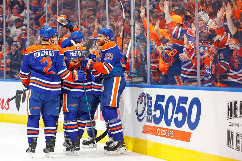 Oct 8, 2025; Edmonton, Alberta, CAN; The Edmonton Oilers celebrate a goal scored by forward Ryan Nugent-Hopkins (93) during the first period against the Calgary Flames at Rogers Place. Mandatory Credit: Perry Nelson-Imagn Images