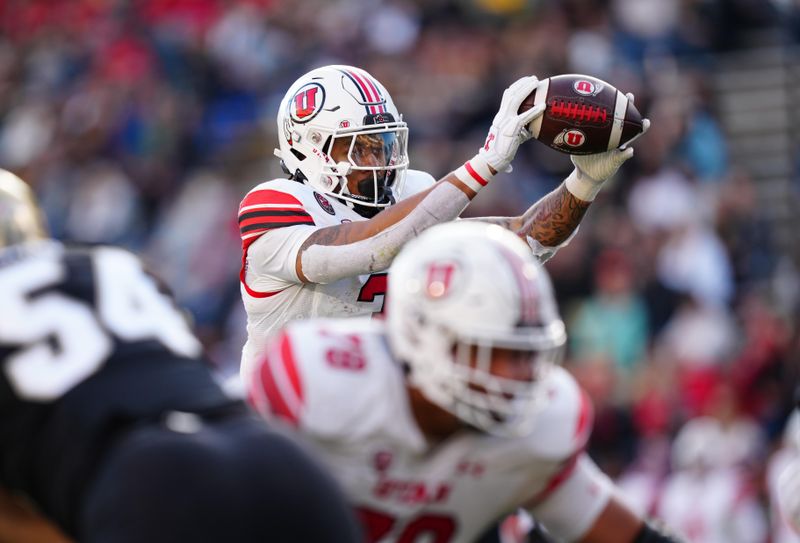 Nov 26, 2022; Boulder, Colorado, USA; Utah Utes running back Ja'Quinden Jackson (3) takes a direct snap prior to his touchdown carry in the first quarter against the Colorado Buffaloes at Folsom Field. Mandatory Credit: Ron Chenoy-USA TODAY Sports