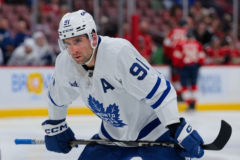 Nov 27, 2024; Sunrise, Florida, USA; Toronto Maple Leafs center John Tavares (91) looks on against the Florida Panthers during the second period at Amerant Bank Arena. Mandatory Credit: Sam Navarro-Imagn Images