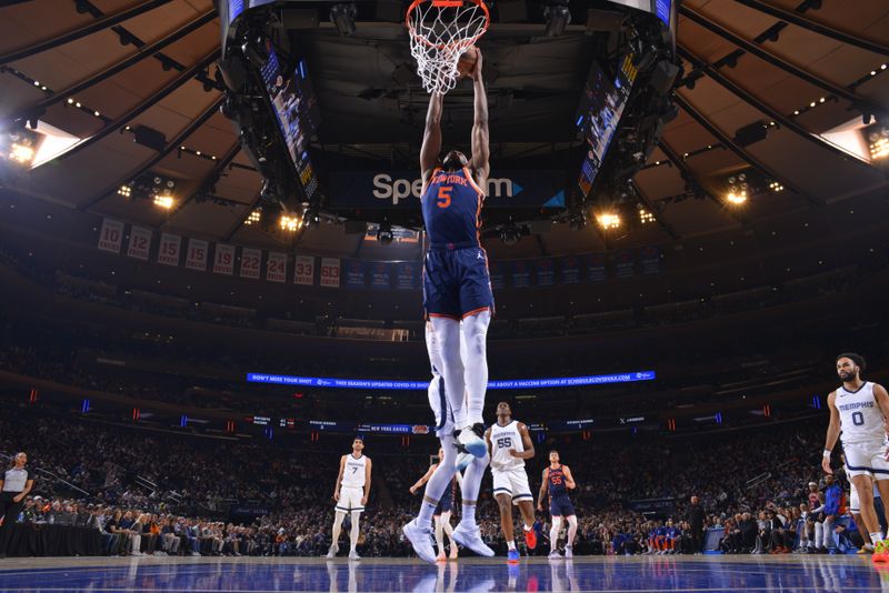 NEW YORK, NY - FEBRUARY 6: Precious Achiuwa #5 of the New York Knicks drives to the basket during the game against the Memphis Grizzlies on February 6, 2024 at Madison Square Garden in New York City, New York.  NOTE TO USER: User expressly acknowledges and agrees that, by downloading and or using this photograph, User is consenting to the terms and conditions of the Getty Images License Agreement. Mandatory Copyright Notice: Copyright 2024 NBAE  (Photo by Jesse D. Garrabrant/NBAE via Getty Images)