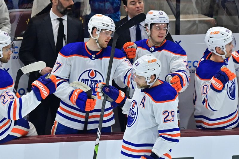 Mar 27, 2023; Tempe, Arizona, USA;  Edmonton Oilers center Leon Draisaitl (29) celebrates with tammates after scoring a goal in the second period against the Arizona Coyotes at Mullett Arena. Mandatory Credit: Matt Kartozian-USA TODAY Sports